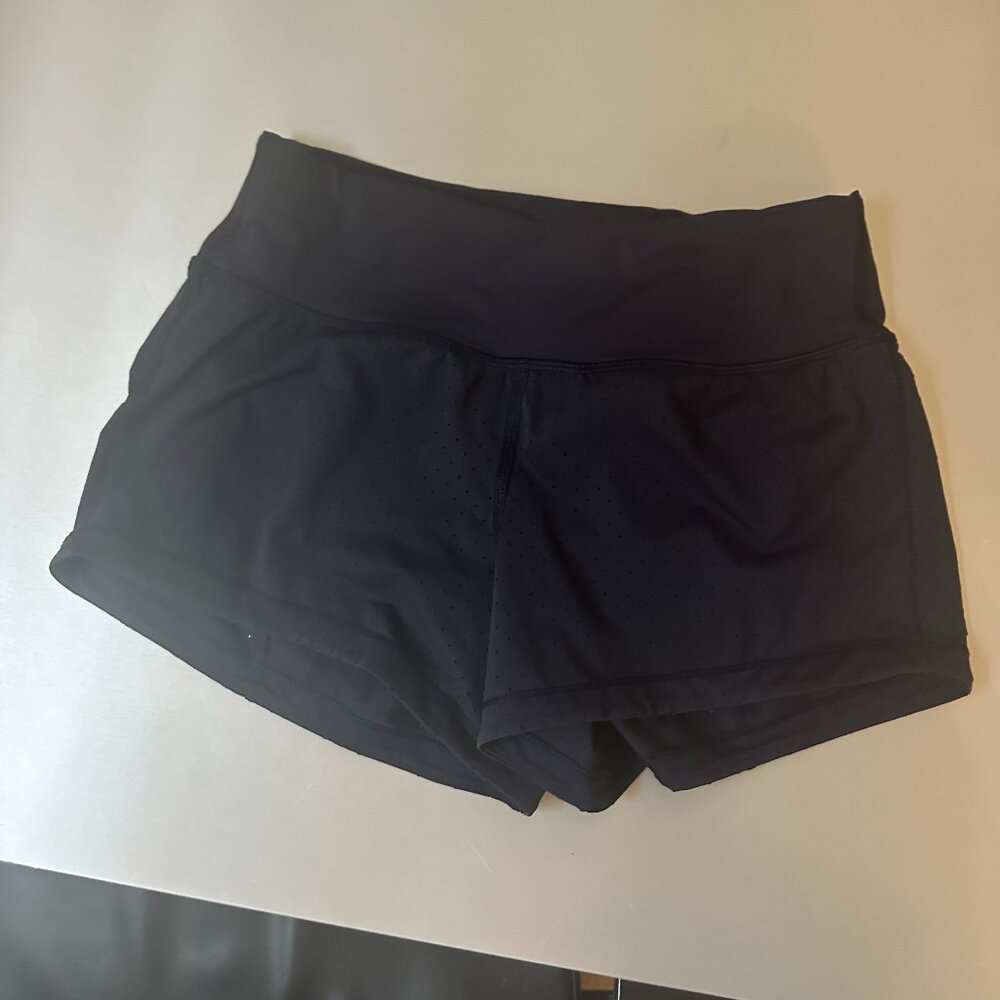 lululemon navy blue mid rise athletic shorts